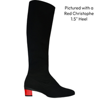 Black knee-high boot with a red heel on a white background