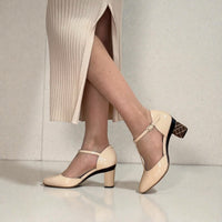 tanya heath paris interchangeable heels with nude t-strap marla pump. 1.5" low croc print heel and a nude 2.6" heel.