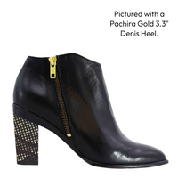 Black leather ankle side xzip boot with gold zipper. purple heel. white background