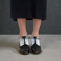 tany aheath black and white oxford shoe front view