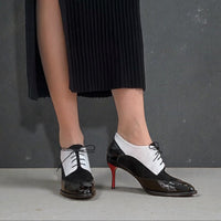 tanya heath black and white spectator pump with red stiletto heel